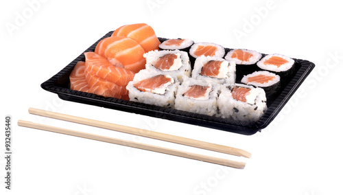 Sushi delivery tray with just angled sashimi and chopsticks photo