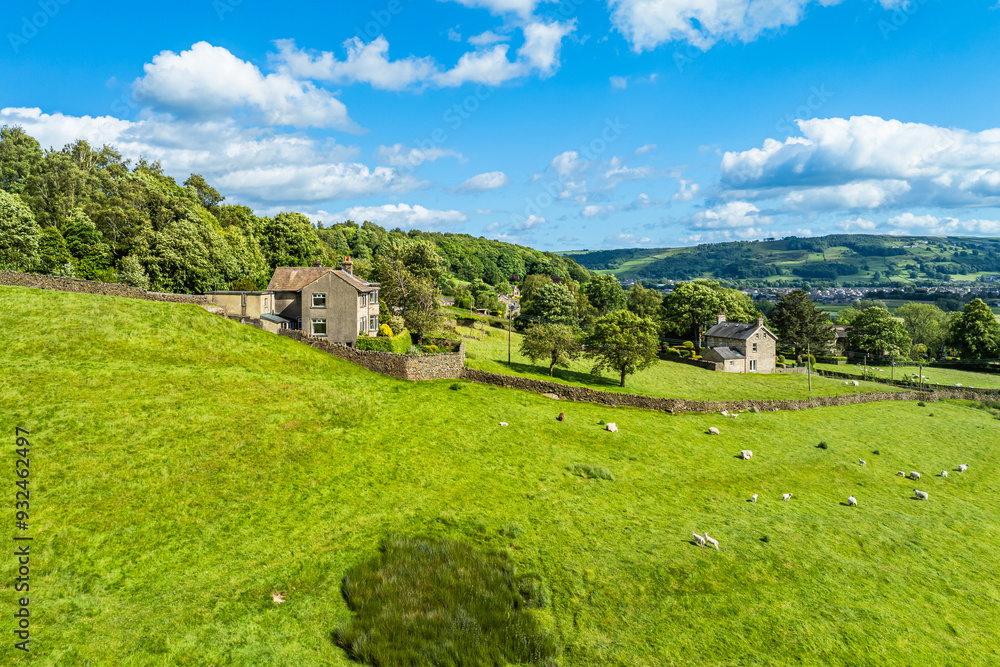 Farms and Fields over Cononley and River Aire from a drone, Keighley, North Yorkshire, England Farms and Fields over Cononley and River Aire from a drone, Keighley, North Yorkshire, England