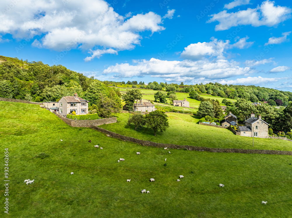Farms and Fields over Cononley and River Aire from a drone, Keighley, North Yorkshire, England Farms and Fields over Cononley and River Aire from a drone, Keighley, North Yorkshire, England