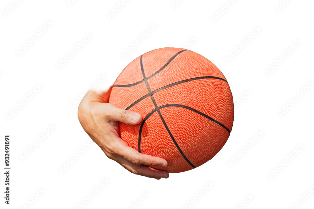 A close-up of a hand firmly gripping a textured basketball, ready for action.
A close-up of a hand firmly gripping a textured basketball, ready for action.