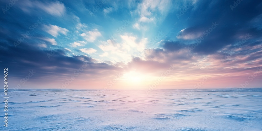 Obraz premium Expansive winter sky over snowy plains 