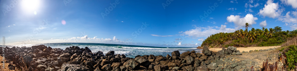 Rincón Beach in Puerto Rico, a heavenly tropical paradise with crystal-clear waters, sandy shores, and lush coastal vegetation, and picturesque Atlantic Ocean shoreline. Rincón Beach in Puerto Rico, a heavenly tropical paradise with crystal-clear waters, sandy shores, and lush coastal vegetation, and picturesque Atlantic Ocean shoreline.