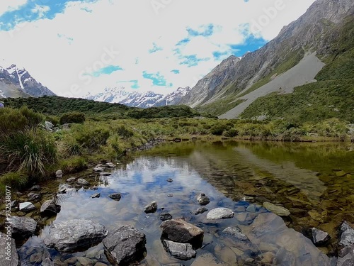 Hooker Valley Stream , Mount Cook, New Zealand  ,landscape with lake and mountains photo