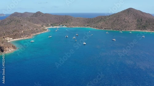 Aerial view, approaching cove with catamarans of Norman Island, BVI