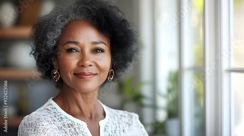 A confident woman with gray...