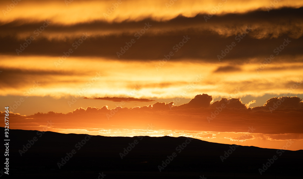 Gorgeous red sunset in Wyoming with nice cloud shapes Gorgeous red sunset in Wyoming with nice cloud shapes