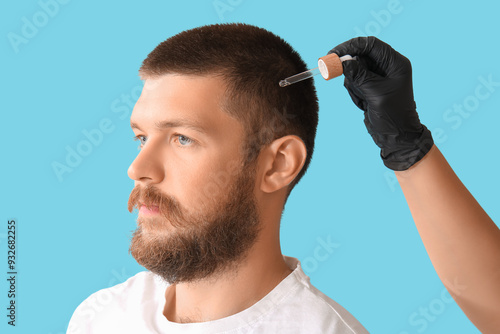 Young man receiving serum f...