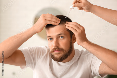 Young man receiving serum f...
