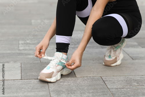Young woman in sportswear a...