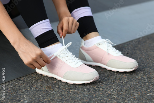 Young woman in sportswear a...