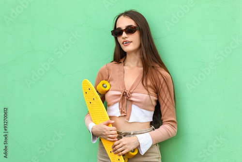 Beautiful young woman in st...