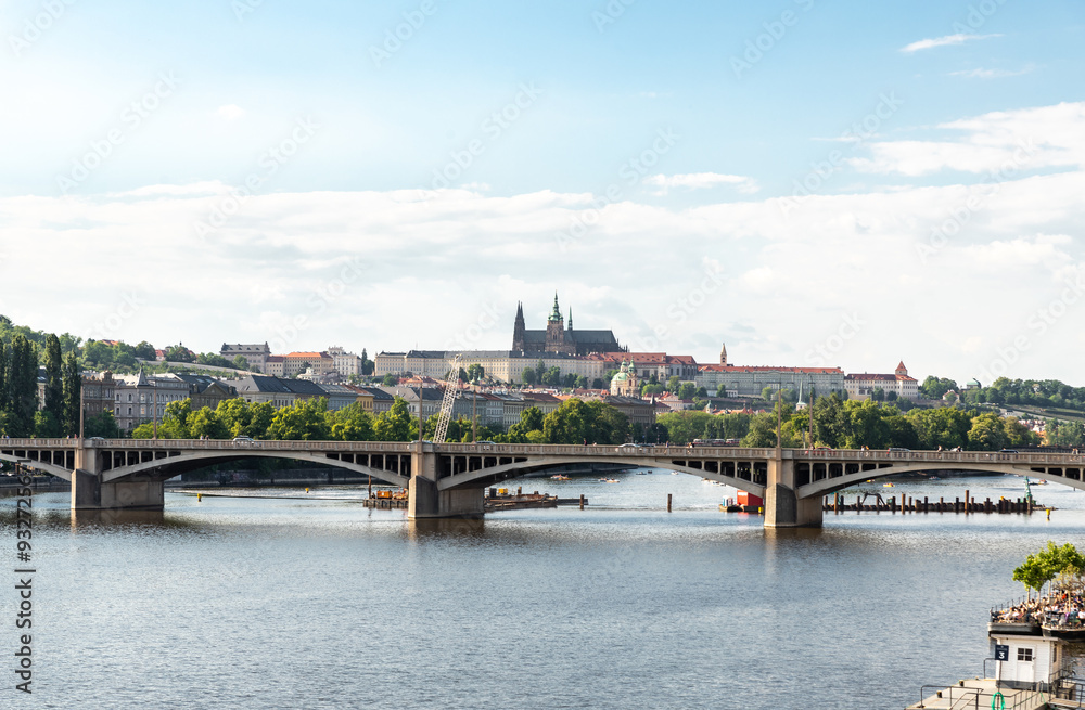 Obraz premium Irasekov Bridge on the Vltava River and the Nova Strana district visible in the distance in Prague in Czech Republic