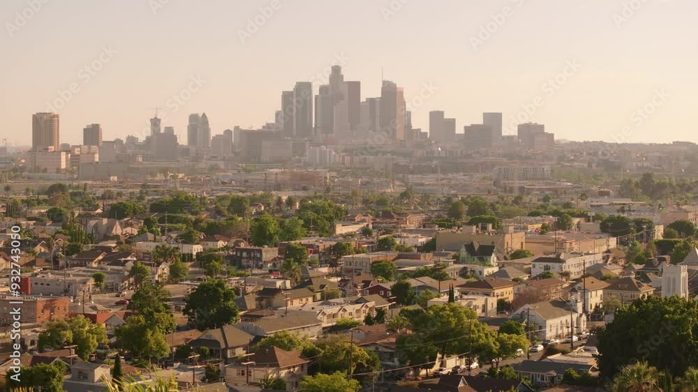 An absolutely stunning aerial view of Downtown Los Angeles beautifully showcases its iconic skyscrapers and vibrant neighborhoods, both full of life and diverse culture An absolutely stunning aerial view of Downtown Los Angeles beautifully showcases its iconic skyscrapers and vibrant neighborhoods, both full of life and diverse culture