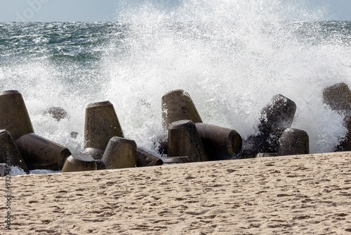 Obraz na płótnie Coastal protection during storms by the tetrapods on the island of Sylt w salonie
