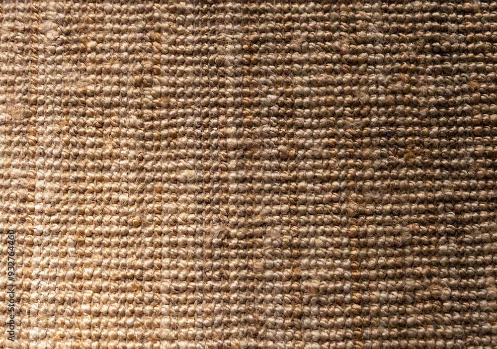A close up of a brown and tan carpet with a lot of texture A close up of a brown and tan carpet with a lot of texture
