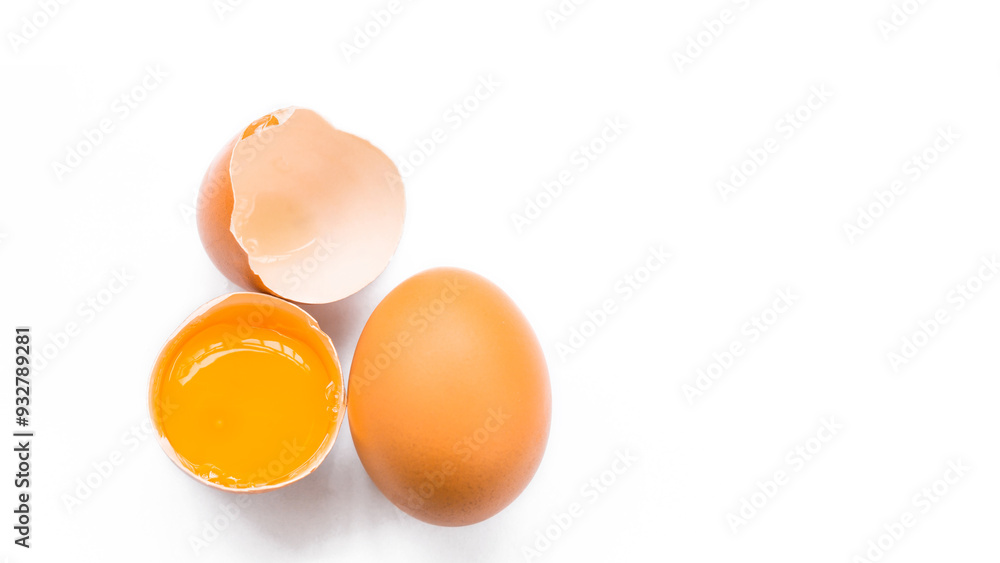 Chicken eggs and egg yolk on white background Chicken eggs and egg yolk on white background