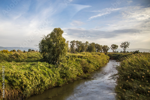 Israel, Jordan River flowing into the Sea of Galilee. photo