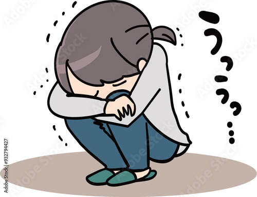 辛くてうずくまって泣く人