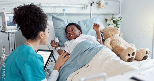 фотографія Tablet, nurse and black child patient in hospital for recovery of surgery for congenital heart disease