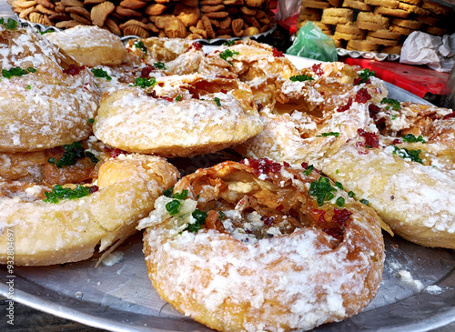 selling traditional sweet dish khajauli or Khaja at matia mahal photo