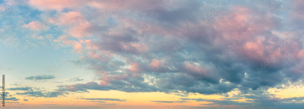Sky panoramic background. Romantic pink clouds in the dawn sky. Tender mood Sunrise Sundown Sunset sky panorama.