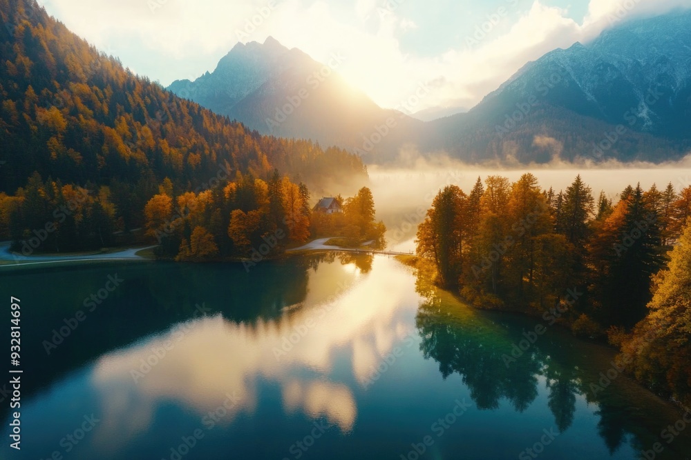 Obraz premium Lake surrounded by trees and mountains