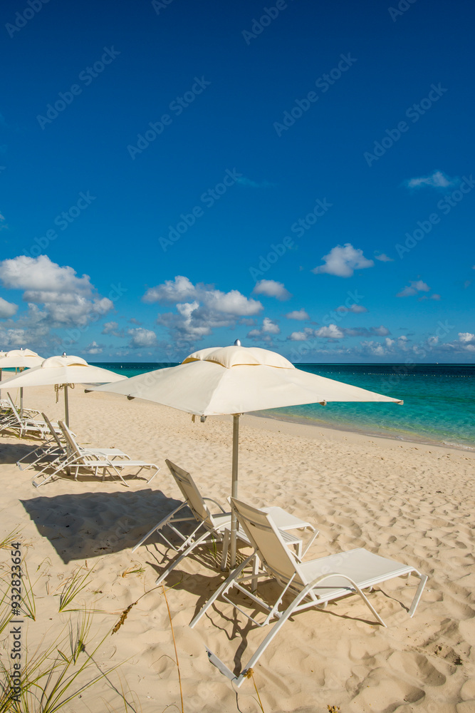 Beach umbrellas on Grace Bay Beach, Providenciales, Turks and Caicos Islands, Caribbean. Beach umbrellas on Grace Bay Beach, Providenciales, Turks and Caicos Islands, Caribbean.