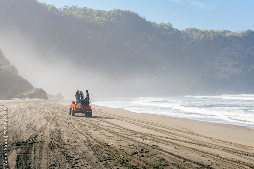 Outback relaxing adventure with 4WD vehicle jeep at the beach of an ocean at sunrise. Travelling with family and adventure togehter Outback relaxing adventure with 4WD vehicle jeep at the beach of an ocean at sunrise. Travelling with family and adventure togehter