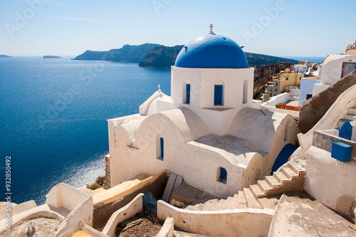 Greece, Santorini, Oia. View of the blue domed Santorini caldera in Oia.