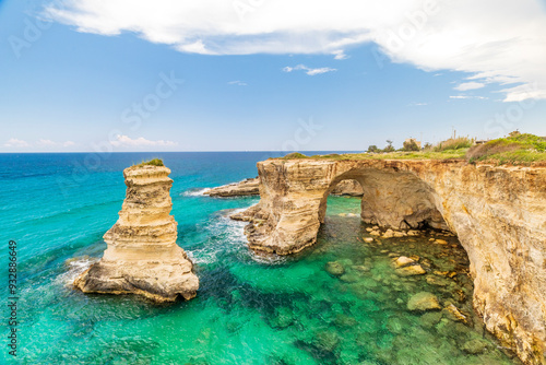 Italy, Apulia, Province of Lecce, Melendugno. The Faraglioni (limestone stacks) of Torre Sant'Andrea. Eroded limestone cliffs above the Adriatic Sea. photo