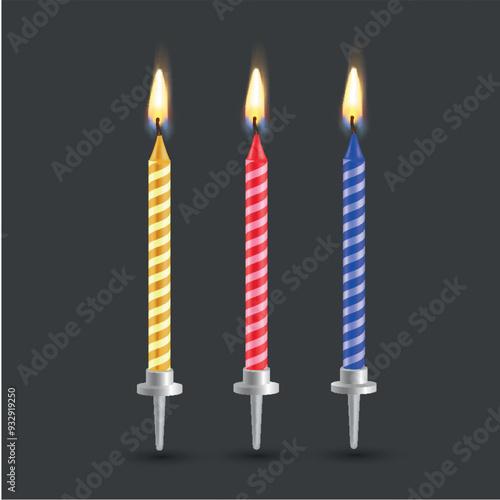 Festive burning candles in bright colors against a dark background