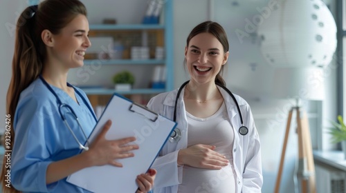 Friendly doctor supports pregnant woman patient at clinic. Smiling nurse or obstetrician with clipboard puts her hand on shoulder of young pregnant lady. Pregnancy photo