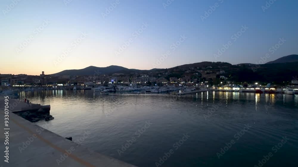 Quayside of the port in the bay of Marina di Camerota, Salerno, Italy. Cilento, Vallo di Diano and Alburni national park. Quayside of the port in the bay of Marina di Camerota, Salerno, Italy. Cilento, Vallo di Diano and Alburni national park.
