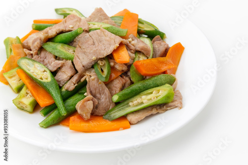 Obraz na płótnie 豚肉とオクラと人参の炒め物 w salonie