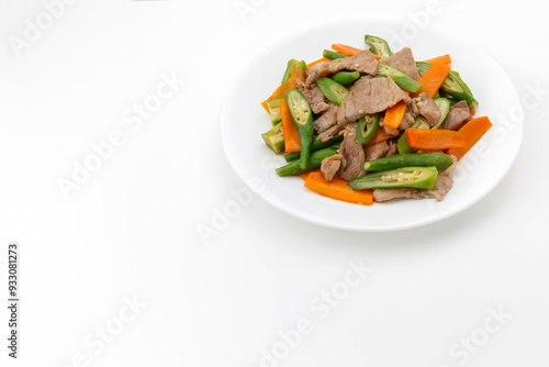Obraz na płótnie 豚肉とオクラと人参の炒め物 w salonie