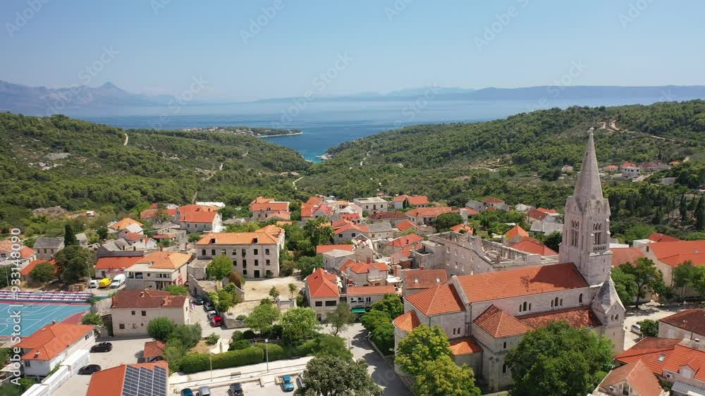 Drone Exploration of Sumartin's Coastal Charms and the Bell Tower of Brač's Historic Church Drone Exploration of Sumartin's Coastal Charms and the Bell Tower of Brač's Historic Church