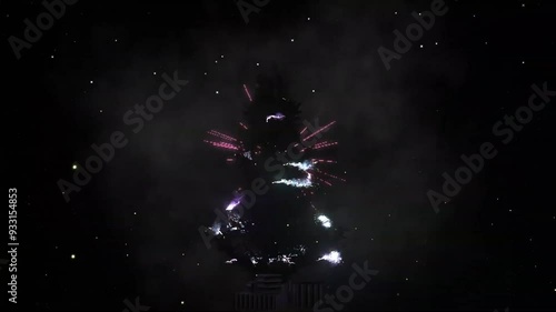 Christmas tree made of glowing tinsel, lasers shine on the background