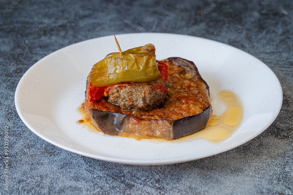 Traditional delicious Turkish food; Kofte kebab wrapped in eggplant (Turkish name; Islim - islim kebabi or kurdan kebabi)