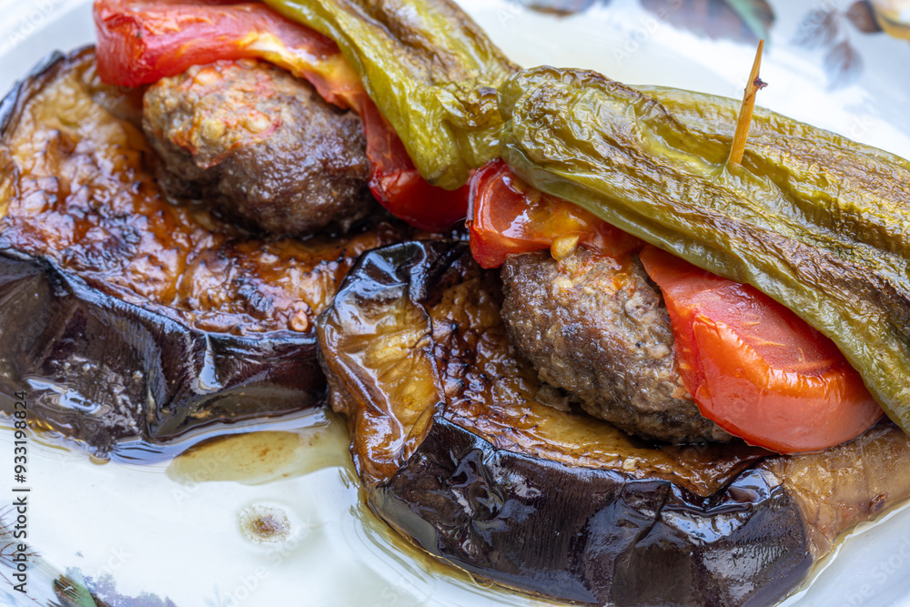 Traditional delicious Turkish food; Kofte kebab wrapped in eggplant (Turkish name; Islim - islim kebabi or kurdan kebabi)