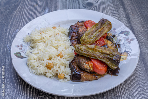Obraz na płótnie Traditional delicious Turkish food; Kofte kebab wrapped in eggplant (Turkish name; Islim - islim kebabi or kurdan kebabi) w salonie