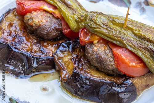 Obraz na płótnie Traditional delicious Turkish food; Kofte kebab wrapped in eggplant (Turkish name; Islim - islim kebabi or kurdan kebabi) w salonie