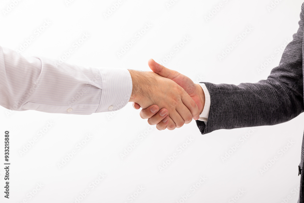 握手している男性二人