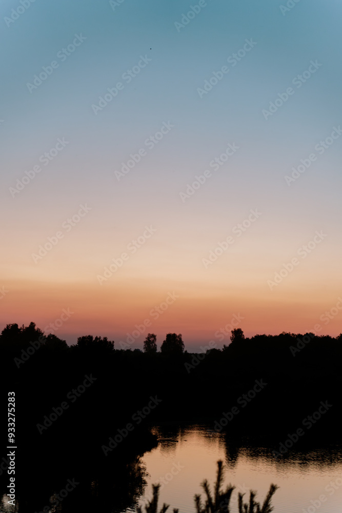 sunset in the mountains over the lake, beautiful color gradient sunset in the mountains over the lake, beautiful color gradient
