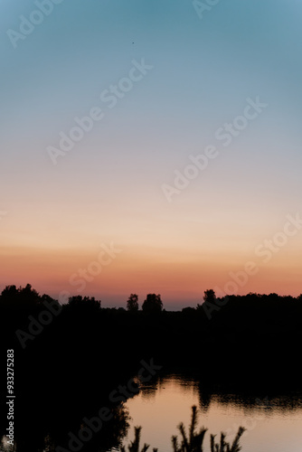 sunset in the mountains over the lake, beautiful color gradient