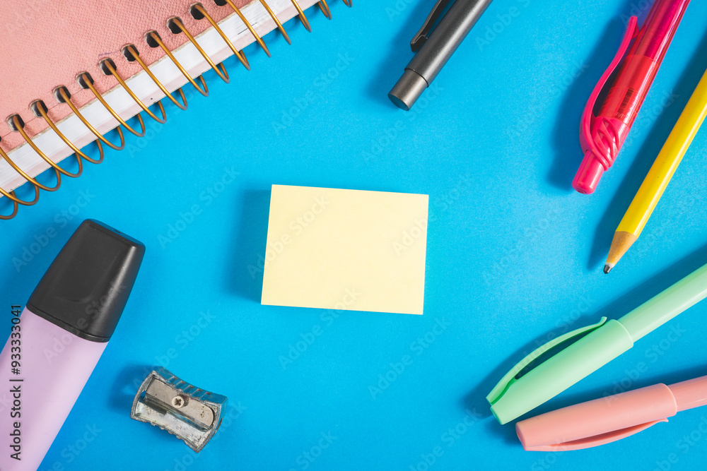 Different kind of school/office supplies for studying, on a blue background. Back to school. Different kind of school/office supplies for studying, on a blue background. Back to school.