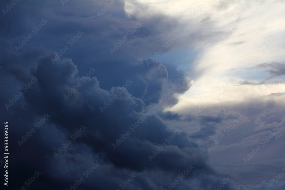dark and light clouds before a thunderstorm. dramatic sky above dark and light clouds before a thunderstorm. dramatic sky above