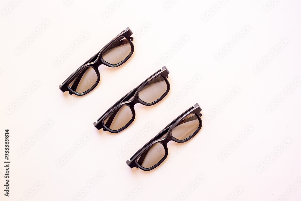 Set of glasses in optics store, top view. Eyesight and vision concept Set of glasses in optics store, top view. Eyesight and vision concept