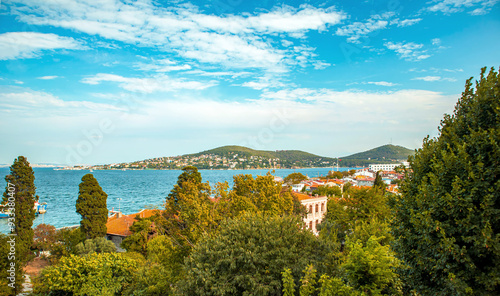 Heybeliada town, buyukada coastal view and sea over trees in the summer, prince islands, adalar, istanbul photo