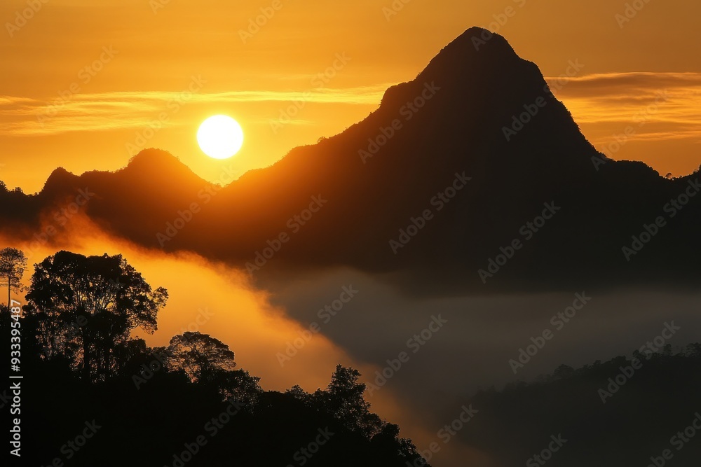 Majestic Mountain Silhouette at Sunrise with Fog and Trees Majestic Mountain Silhouette at Sunrise with Fog and Trees