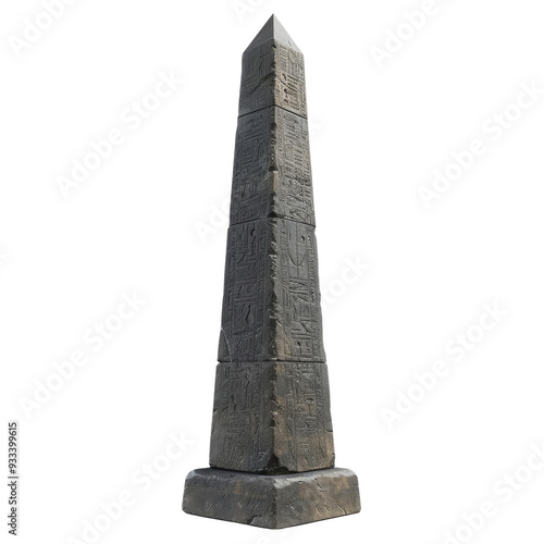 A tall, weathered stone obelisk stands against a black background.  The obelisk is made of rough-hewn stone and has a square base.  It appears to be ancient. photo